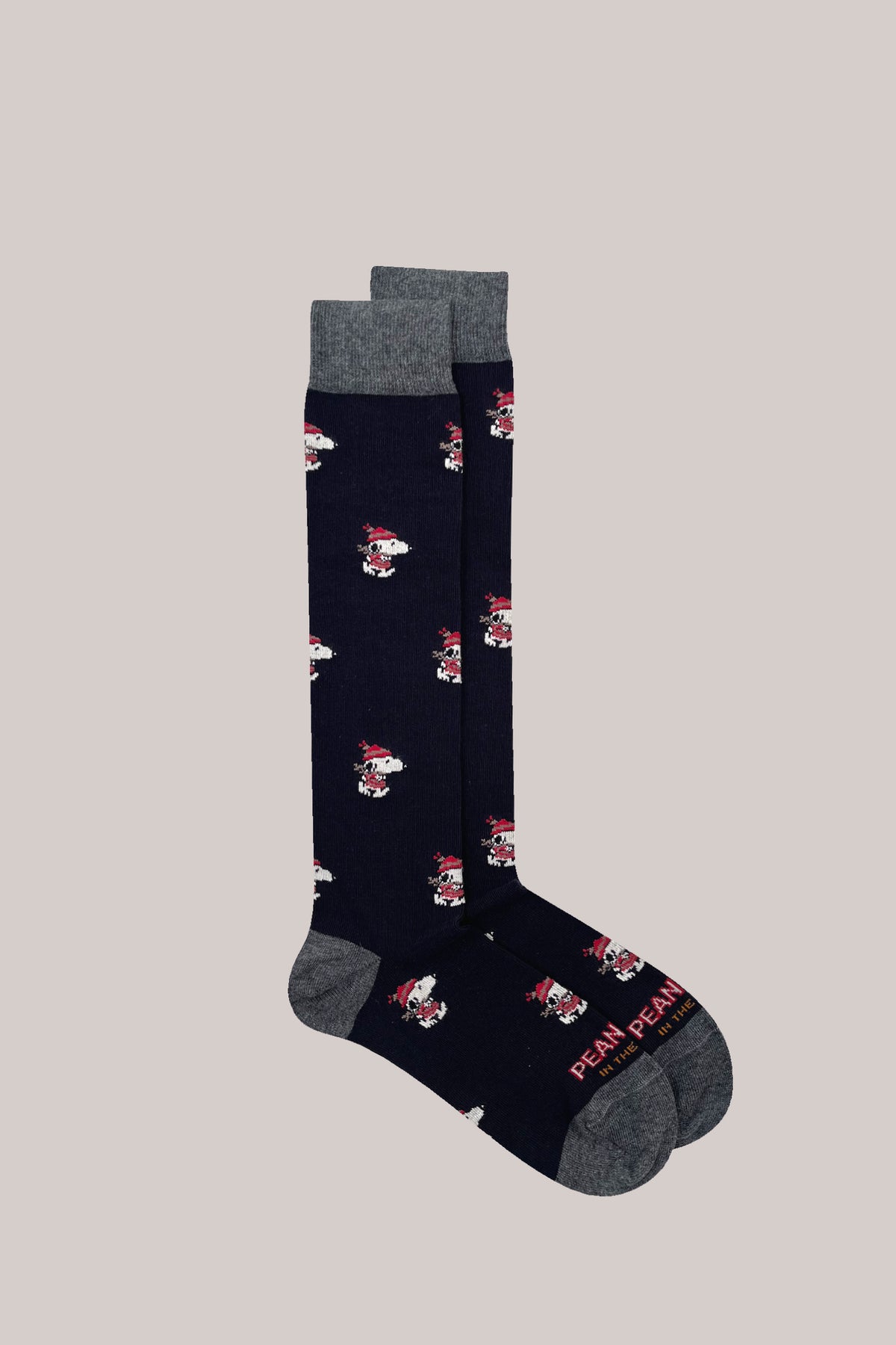 Navy blue calf-length cotton socks featuring Snoopy in a red hat with grey cuffs, heels and toes