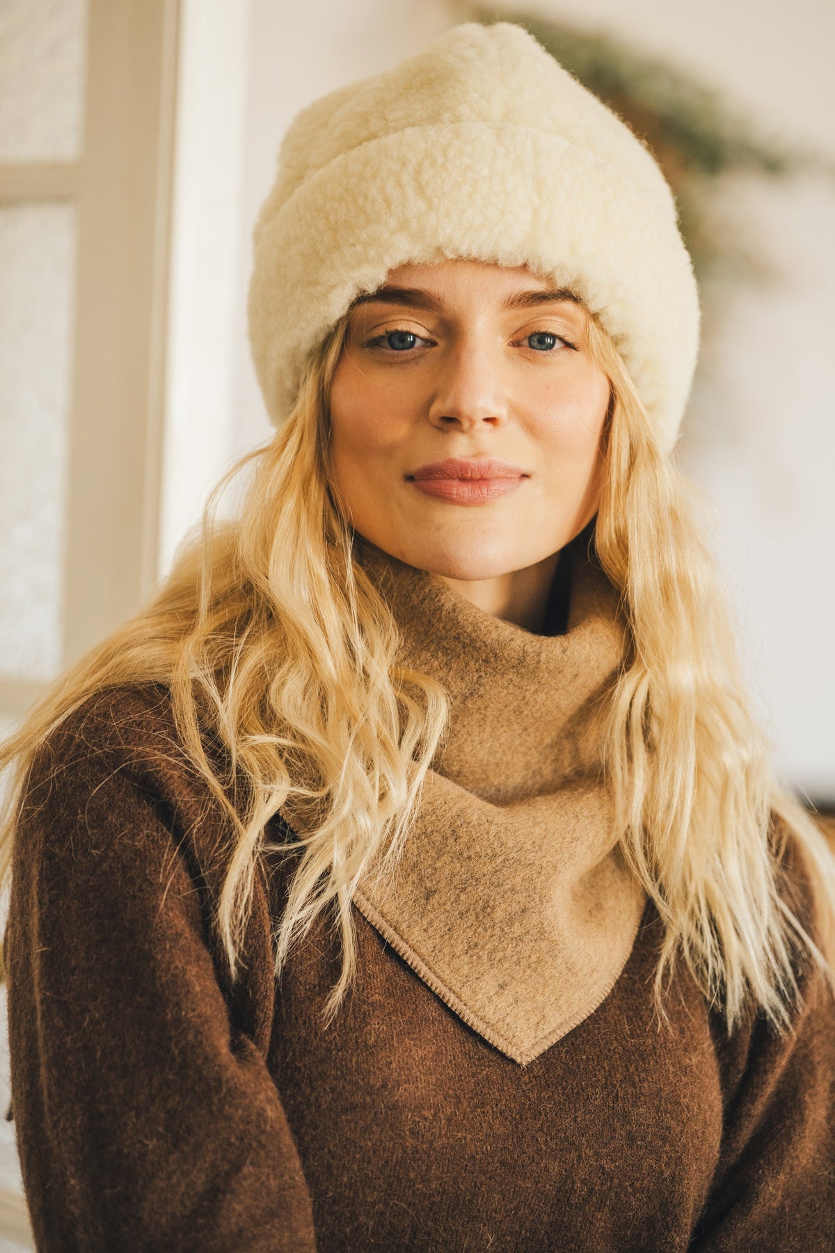 Front view of the wool fleece beanie showing the rounded crown and fit over the forehead