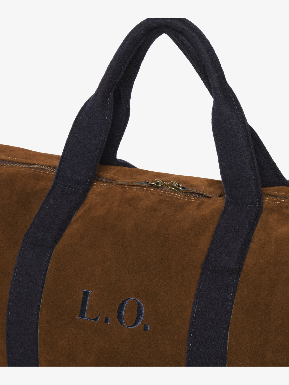 Close-up of the two-way zip, blue felt handles and embroidered L.O. monogram on brown suede
