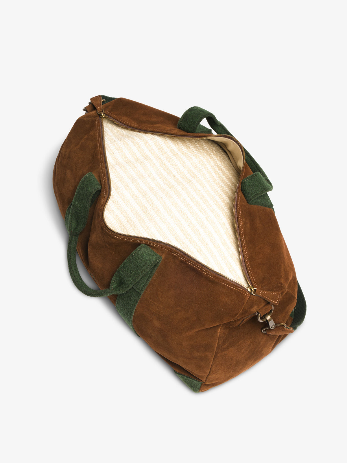 Top view into the unzipped duffle bag showing the cream and beige striped fabric lining