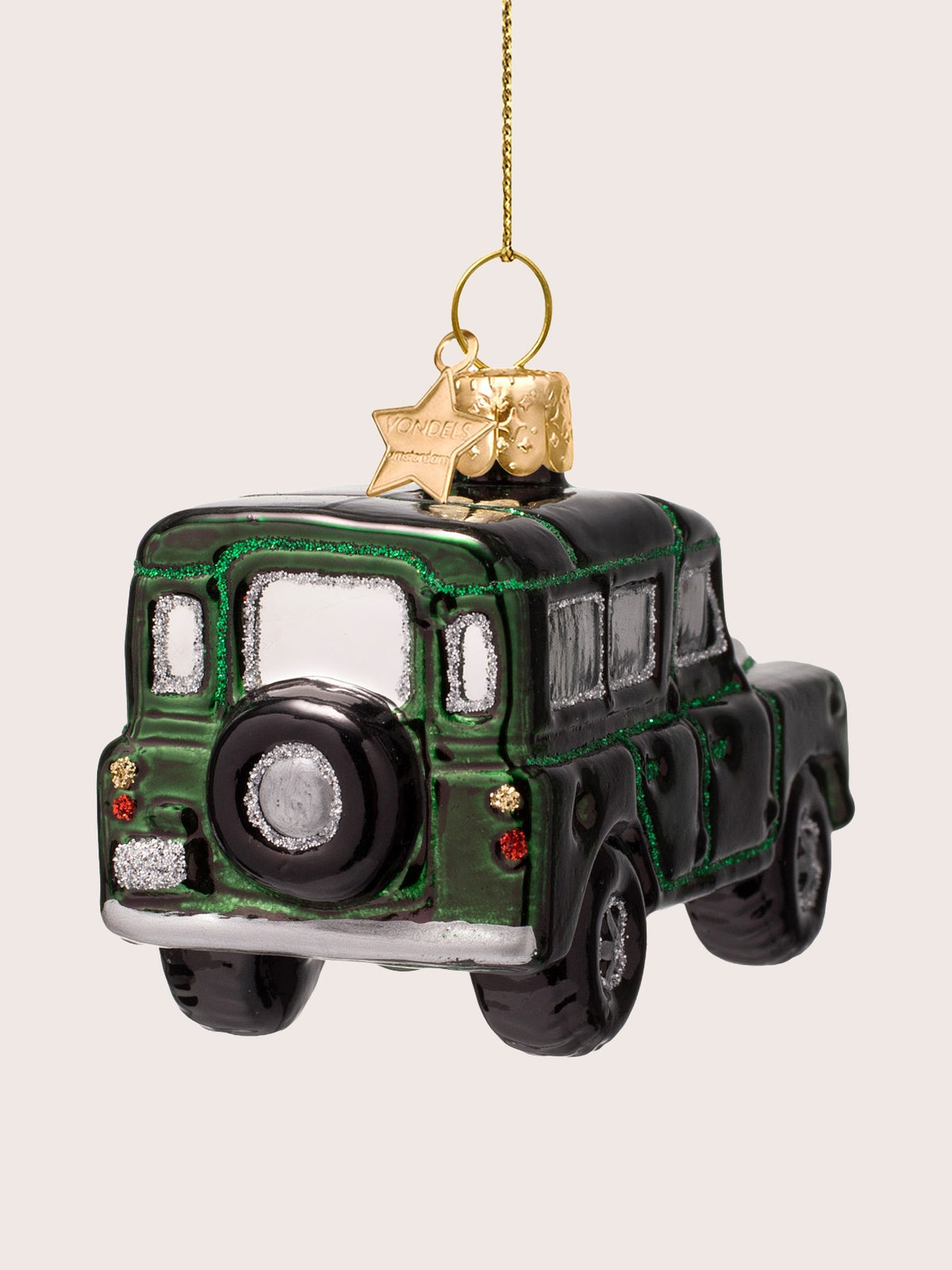 Rear view of the green SUV ornament showing the mounted spare tyre, back window and painted tail lights
