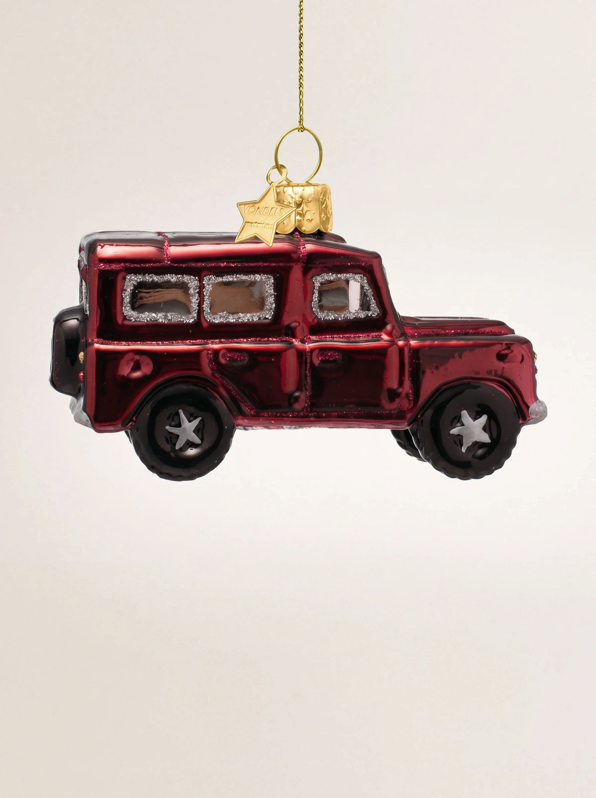 Glass SUV Christmas tree ornament in glossy burgundy with glitter-framed windows, seen from the side