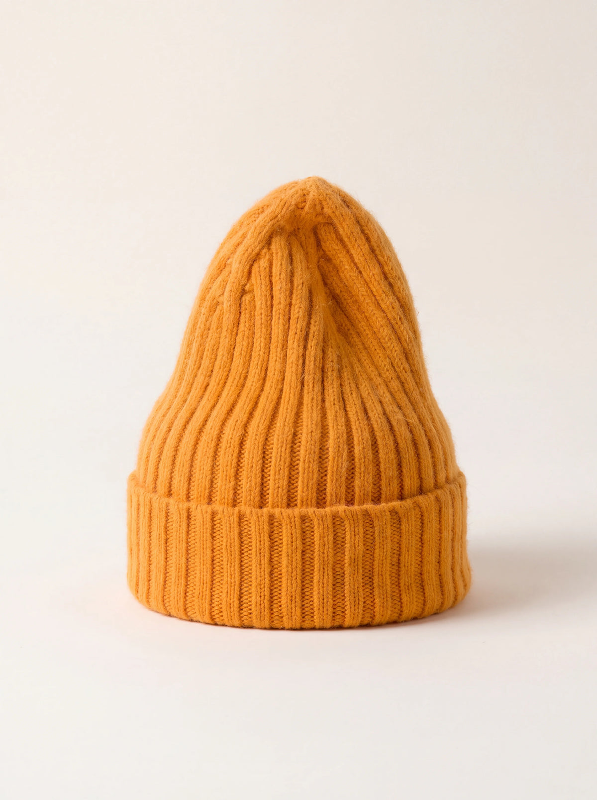 Tall ribbed lambswool-blend beanie in orange with a wide turnover cuff