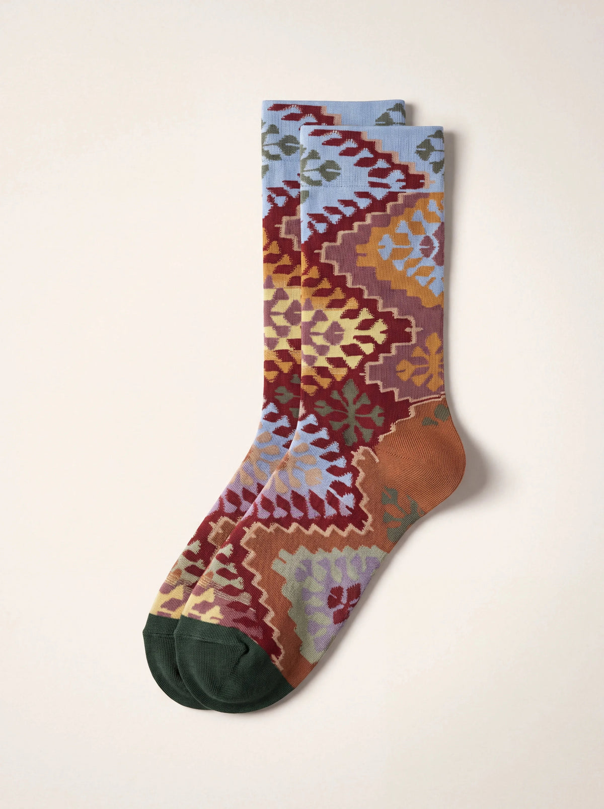 Cotton-blend socks with a multicoloured geometric carpet pattern, light blue cuffs and dark green toes
