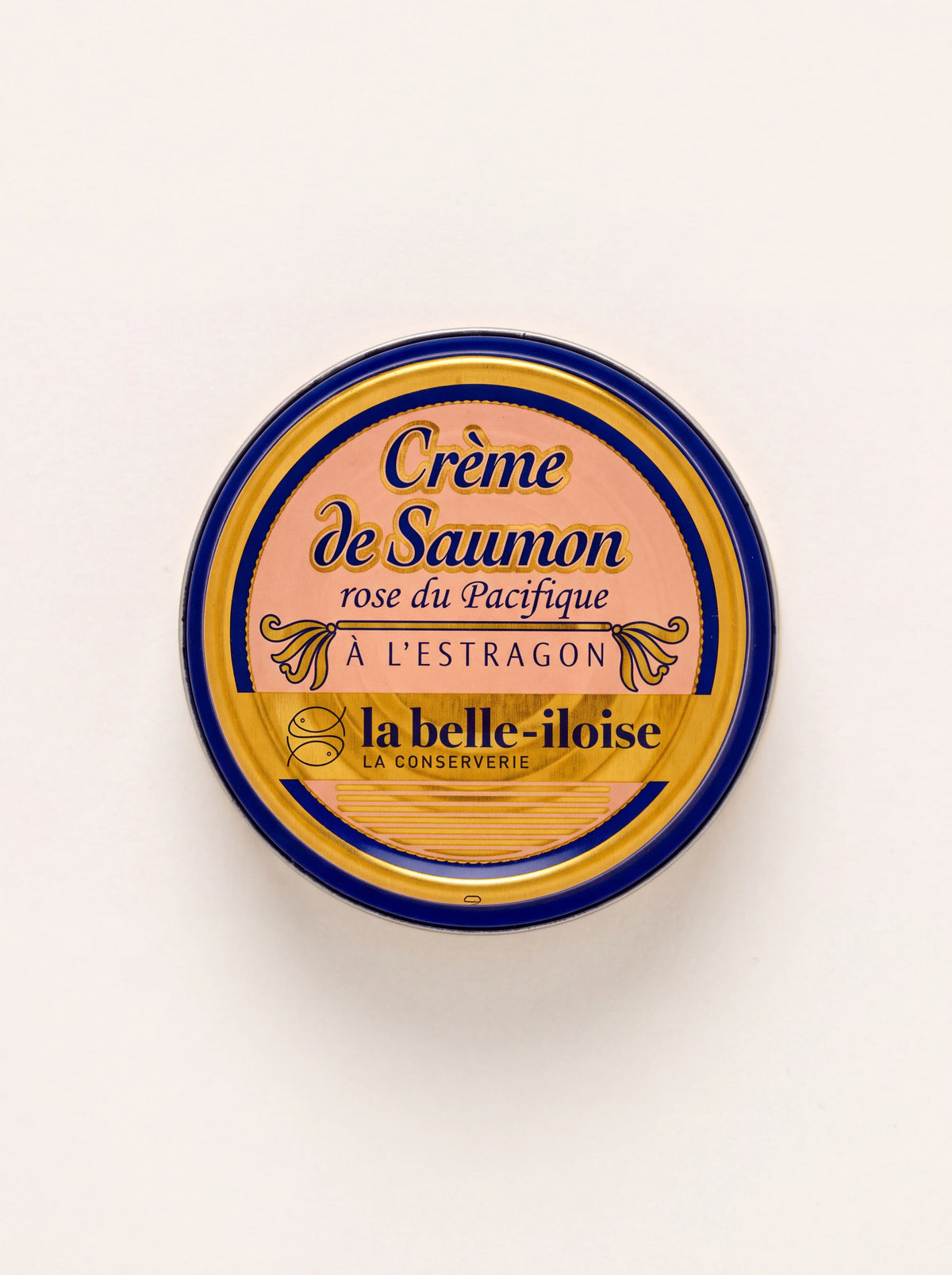 Round tin of tarragon salmon spread with label reading Crème de Saumon rose du Pacifique à l'estragon