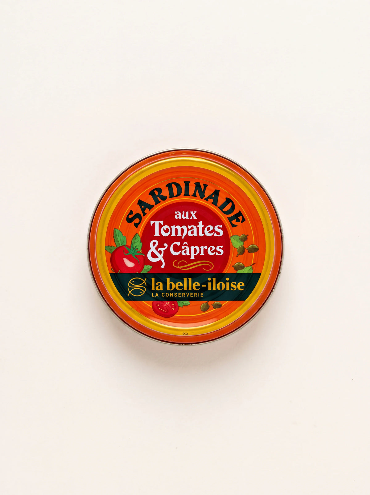 Tomato and caper sardine spread in a round tin with an orange label reading Sardinade aux Tomates & Câpres