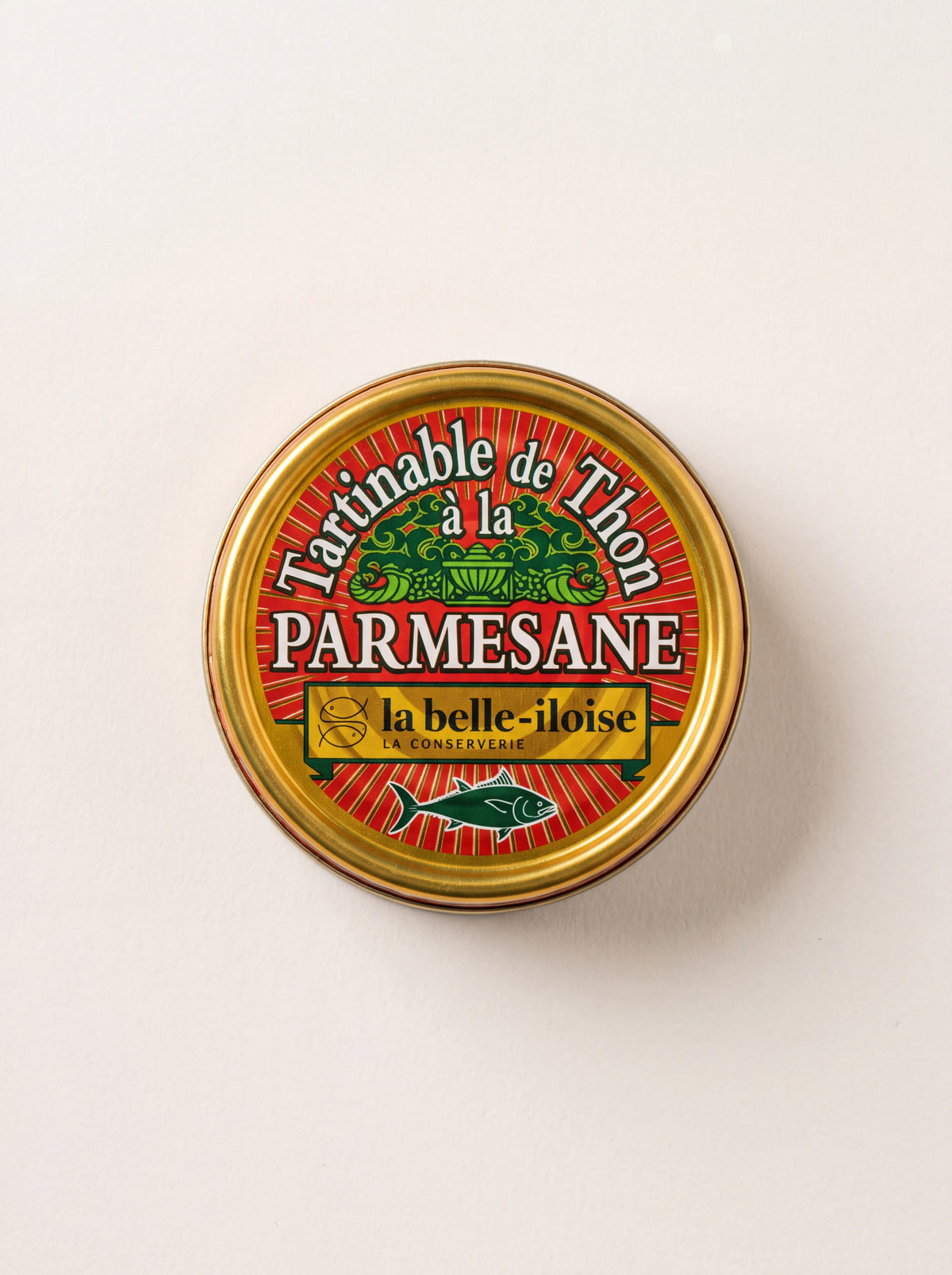 Tuna and parmesan spread in a round gold tin with lid reading Tartinable de Thon à la PARMESANE