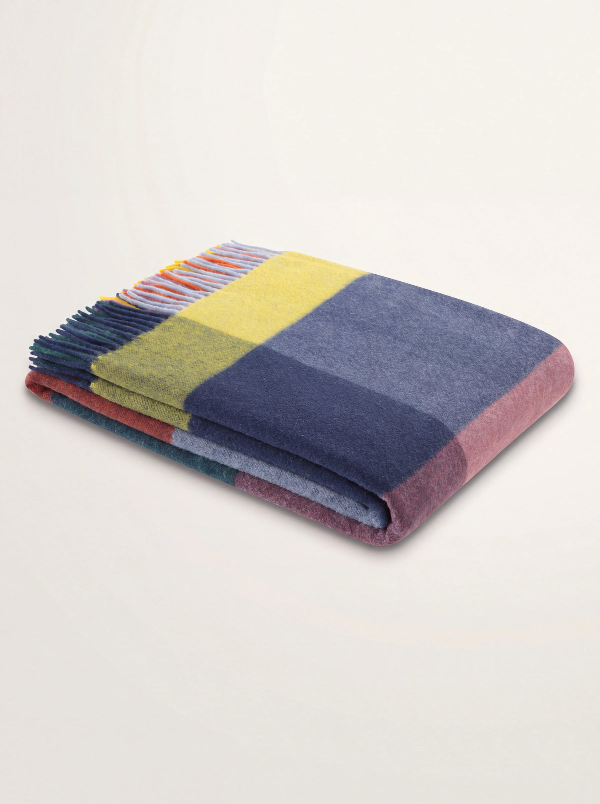 Folded wool and cashmere throw with multicoloured checks in blue, yellow, and mauve with twisted fringes