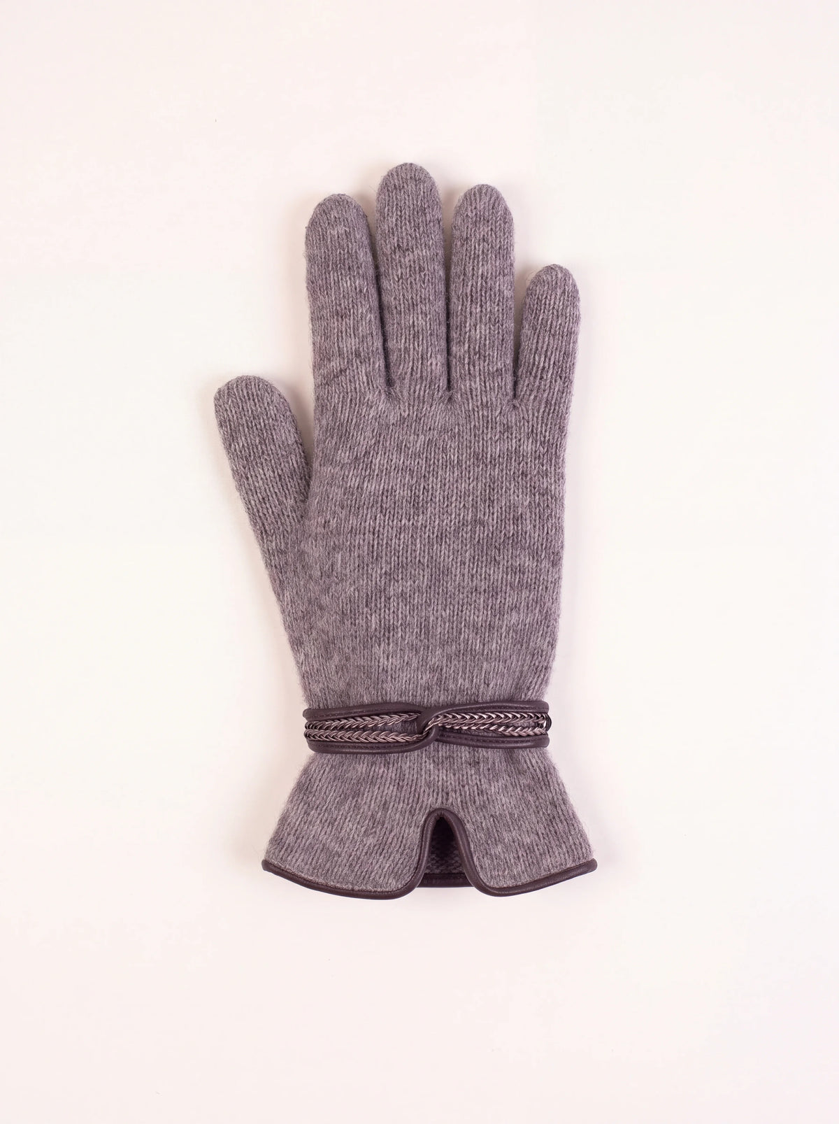 Knitted grey wool and cashmere glove with braided wrist strap and notched cuff with contrast piping
