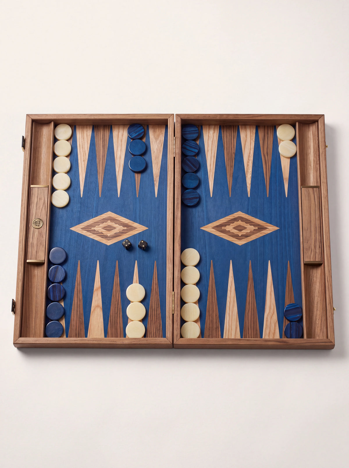 Open walnut backgammon set with a blue oak playing field, inlaid points, checkers and dice