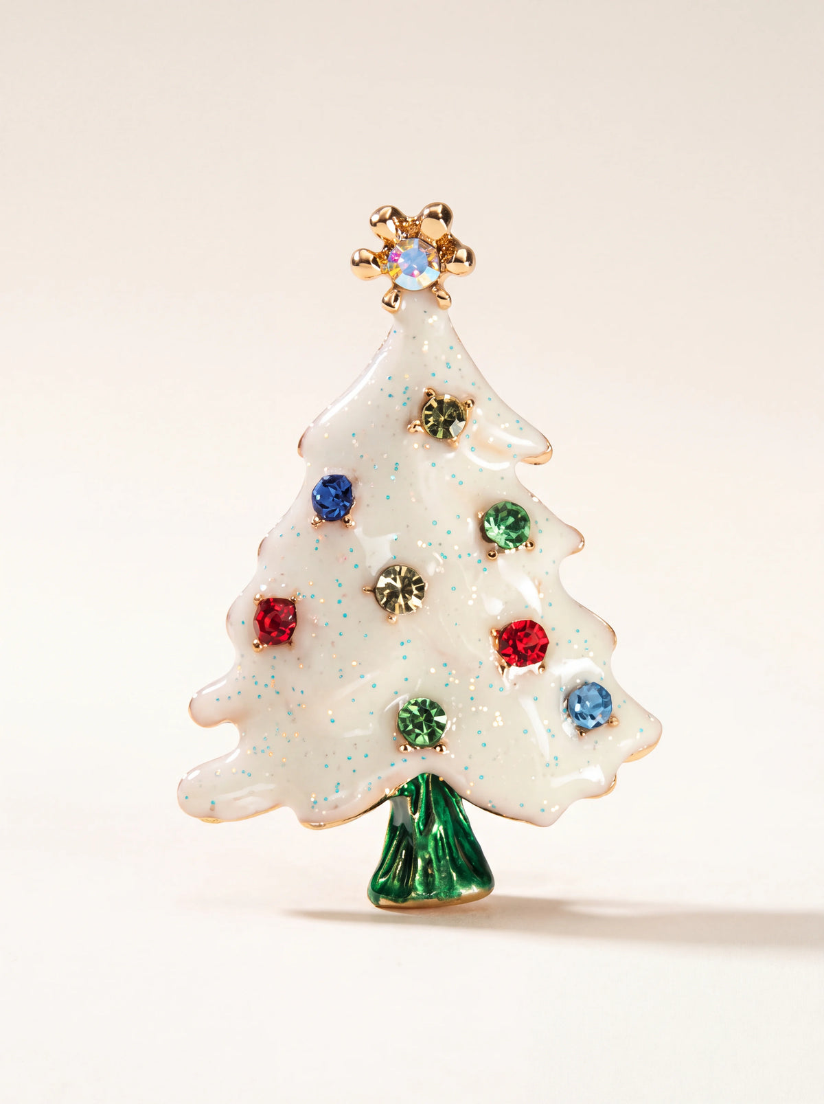 White Christmas tree brooch in glossy metal with glitter, multi-coloured stones and a gold-tone star topper