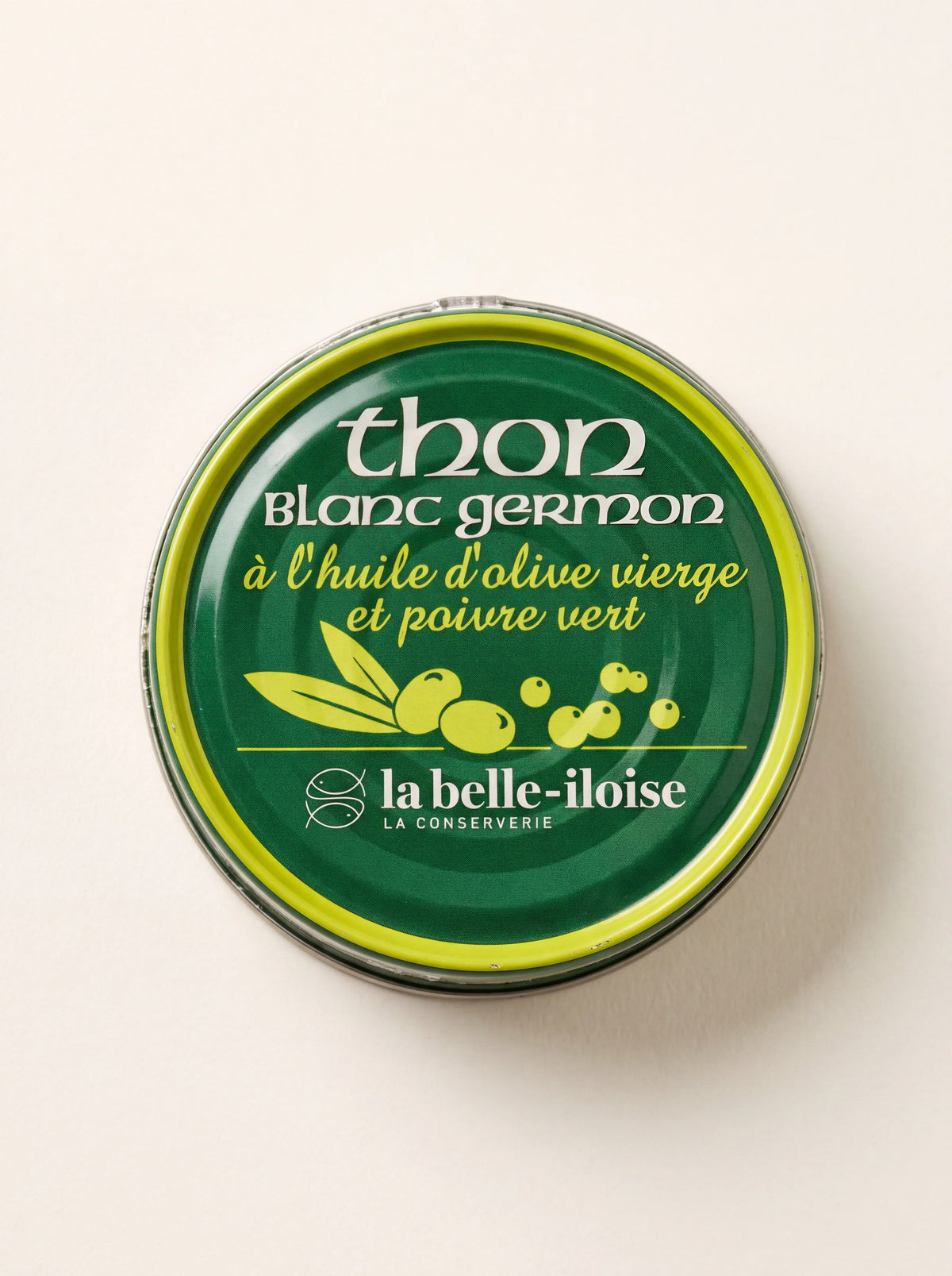 Round green tin of white tuna, labelled thon blanc germon à l'huile d'olive vierge et poivre vert