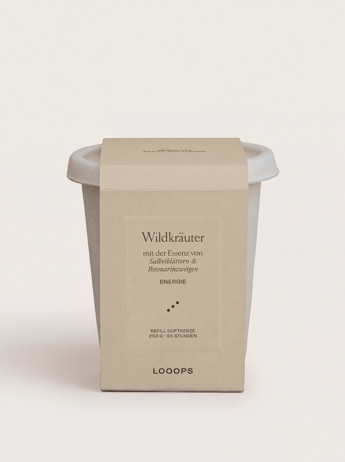 Wildkräuter scented candle refill in a compostable bagasse cup with a sleeve labelled Wildkräuter