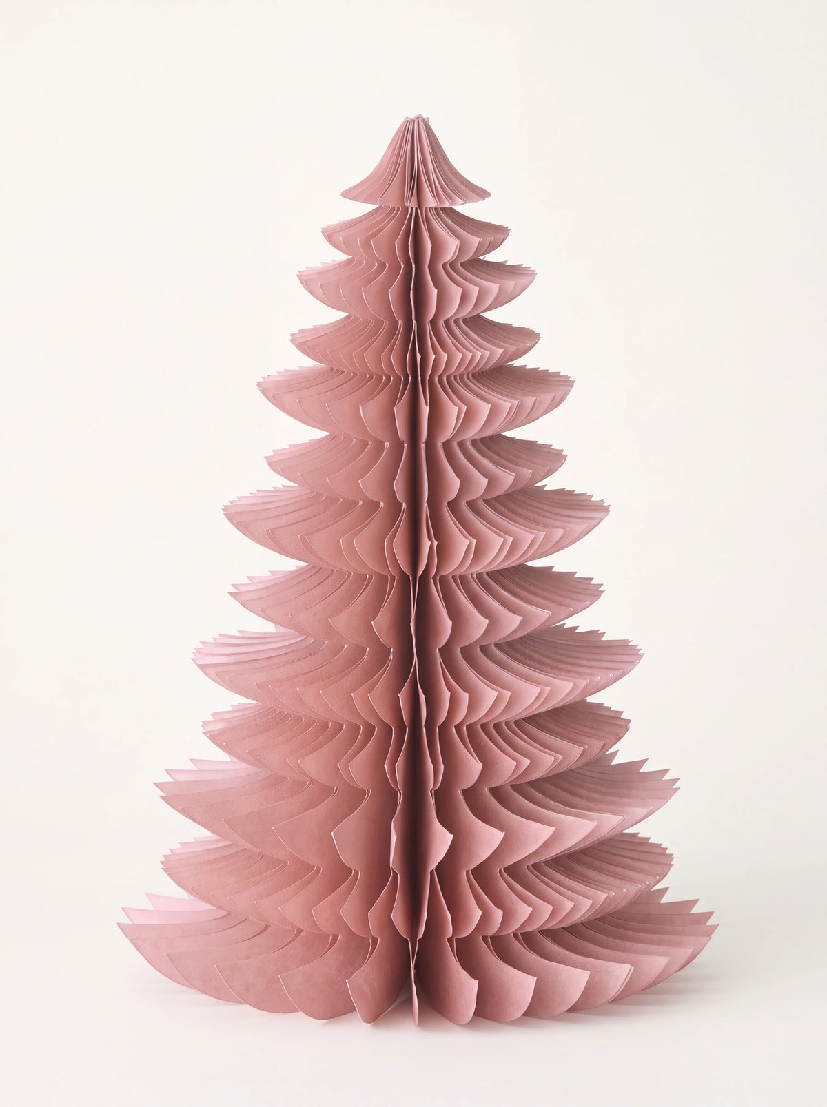 Dusty rose paper tree decoration with a tiered honeycomb structure