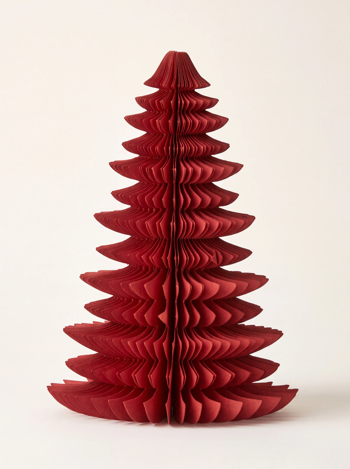 Ruby red paper tree featuring a tiered honeycomb structure and pointed top
