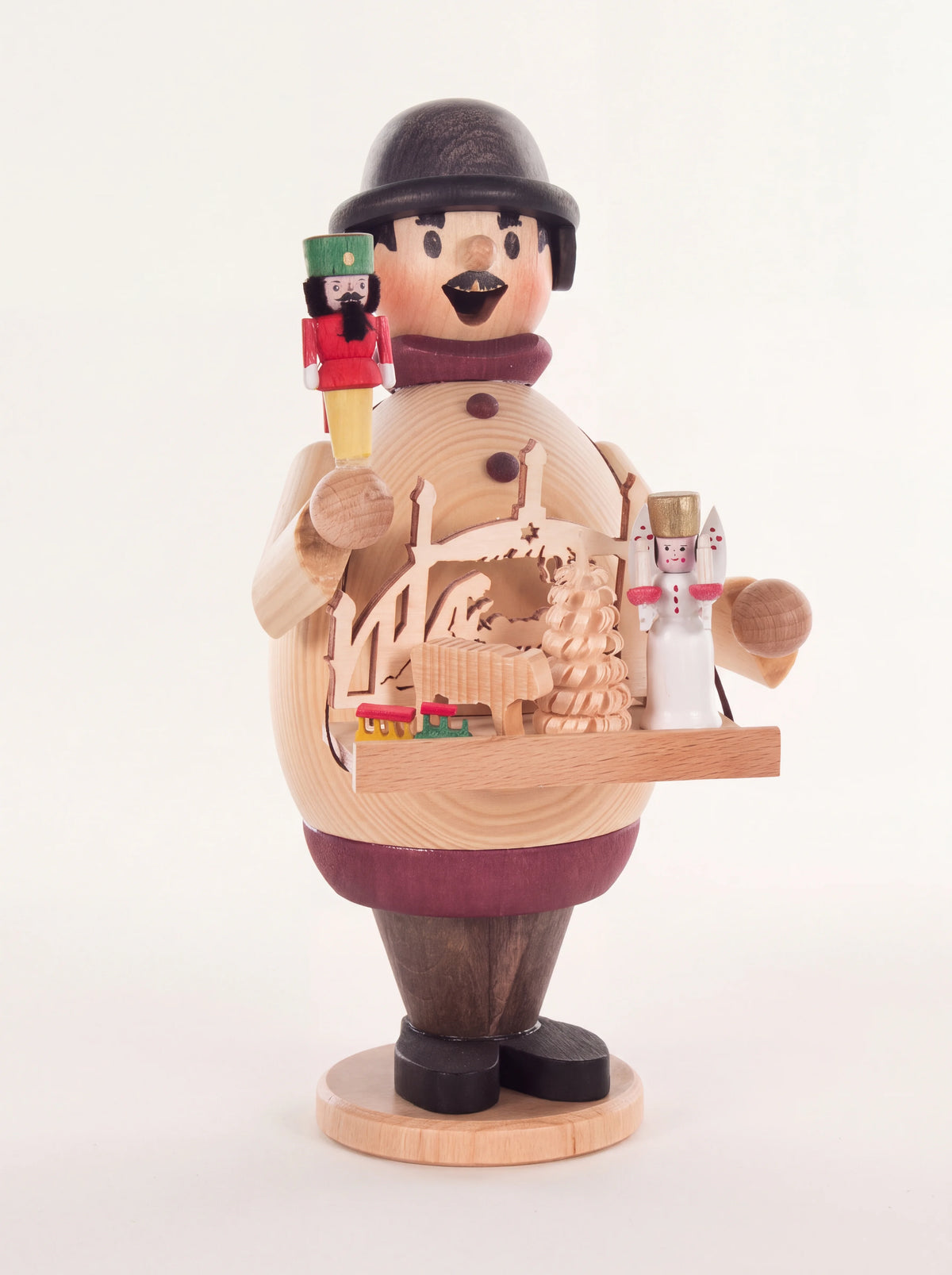 Wooden incense smoker shaped as a market vendor wearing a bowler hat, holding a nutcracker and vendor tray