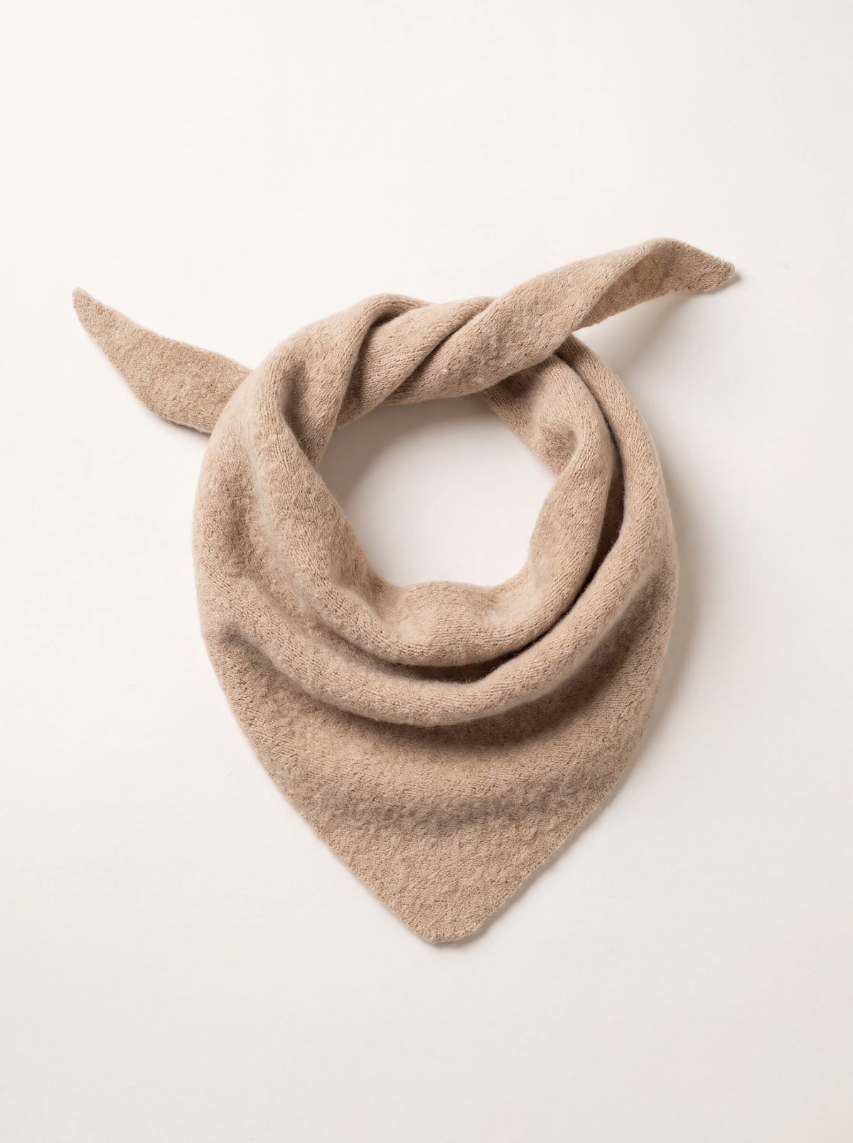 Sand knitted wool bandana draped in a triangular neck shape with tapered ends