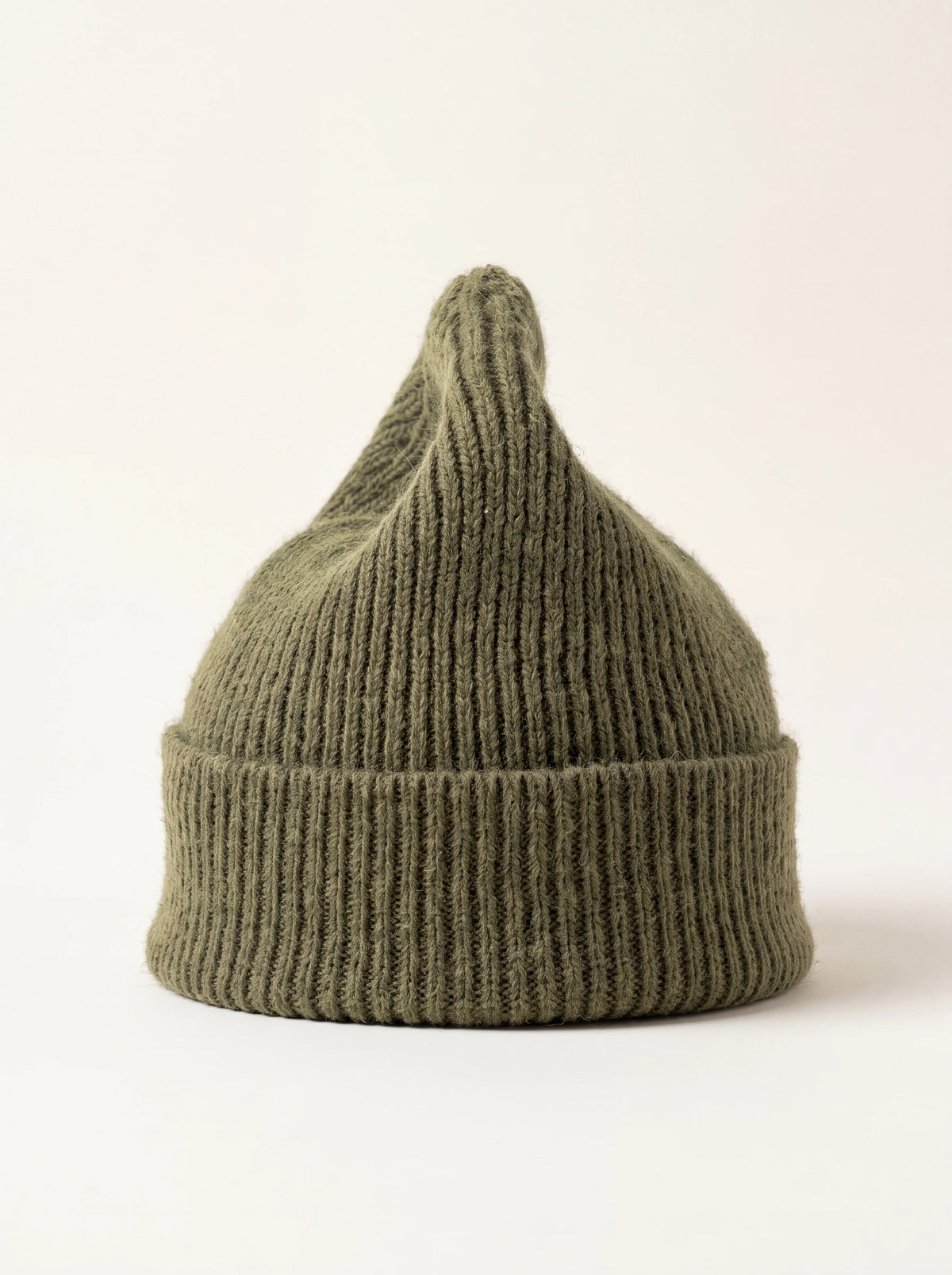 Olive green ribbed knit lambswool beanie with a wide turn-up cuff
