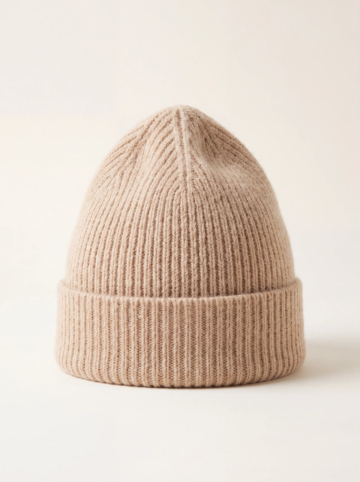 Sand-coloured ribbed lambswool beanie with a wide folded brim