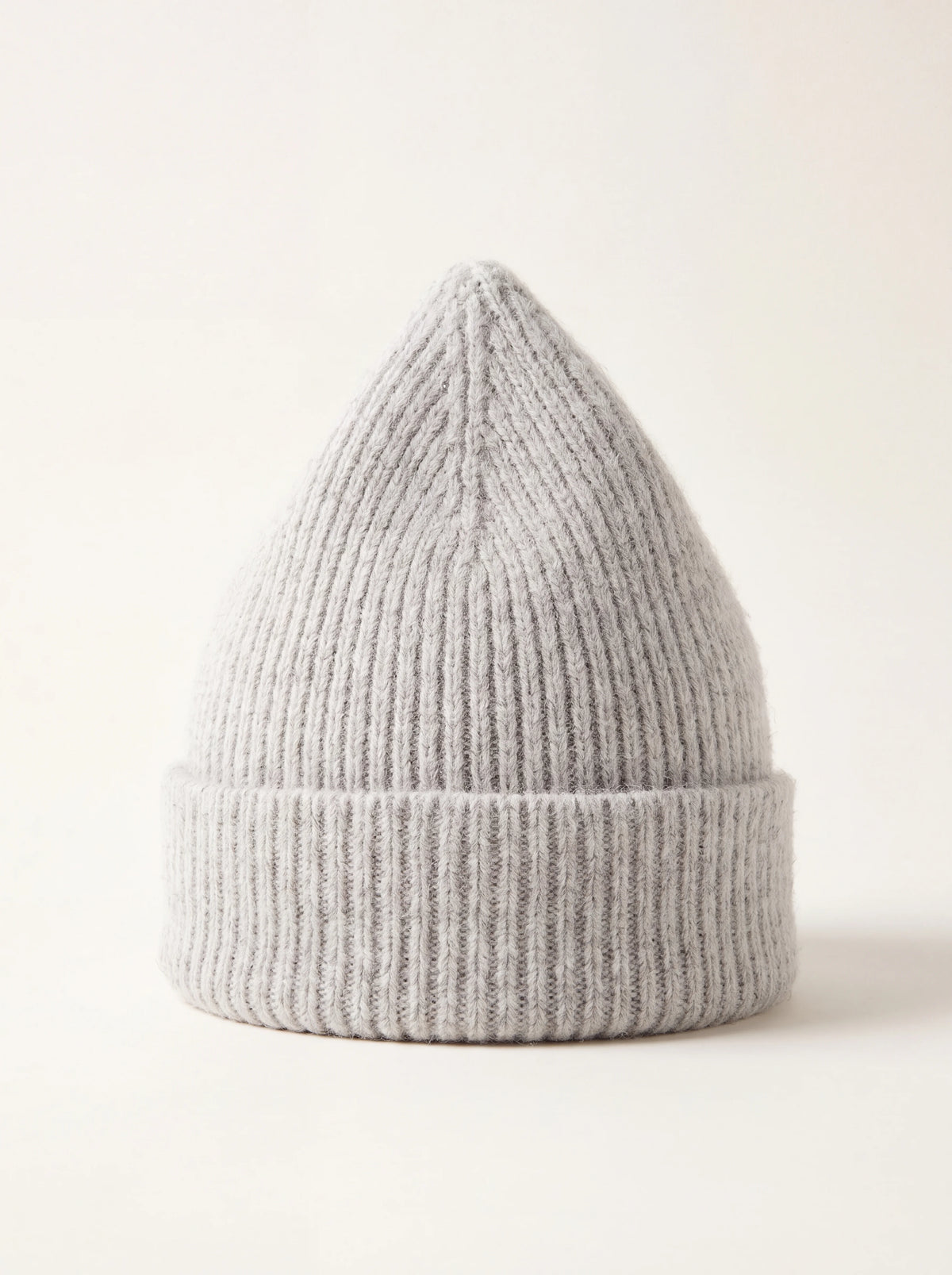 Silver grey ribbed wool beanie with a pointed crown and turned-up brim