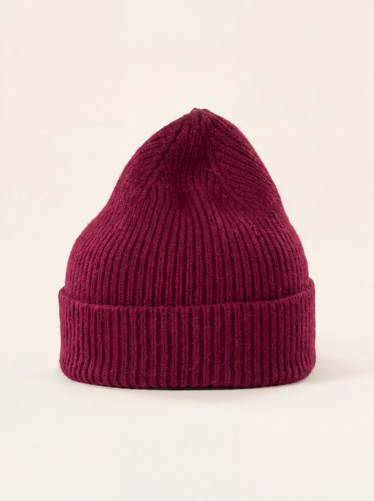 Wine-red ribbed lambswool-blend beanie with a wide turn-up cuff
