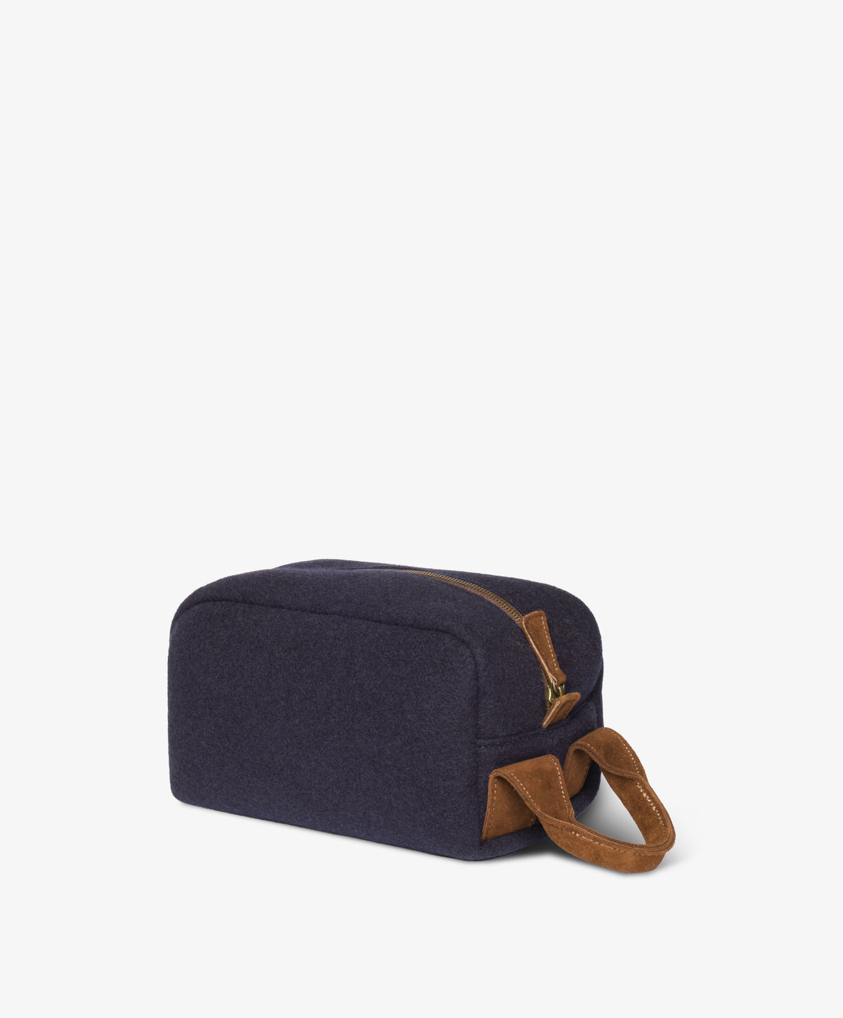 Side perspective showing the rectangular shape and suede loop handle