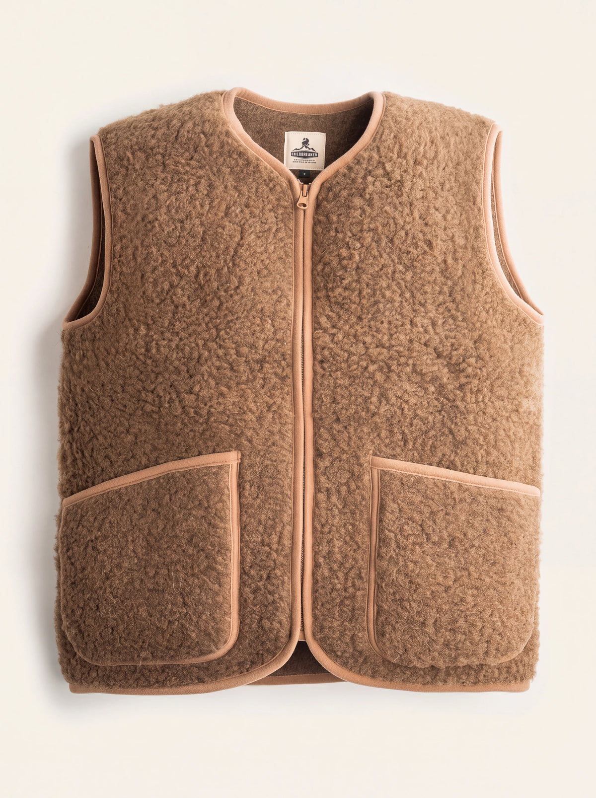 Brown merino wool fleece vest with a zip front, V-neckline, two patch pockets and bound edges