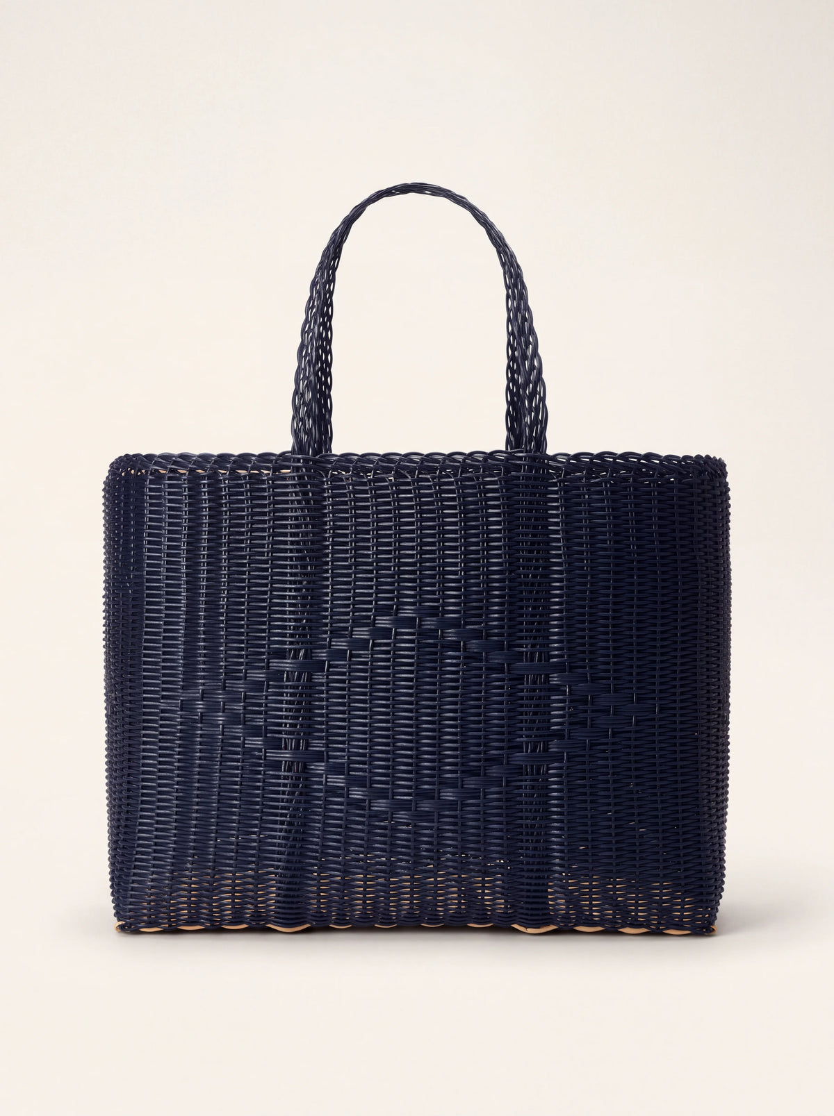 Midnight blue woven plastic tote bag with top handles, subtle diamond pattern and a cream base