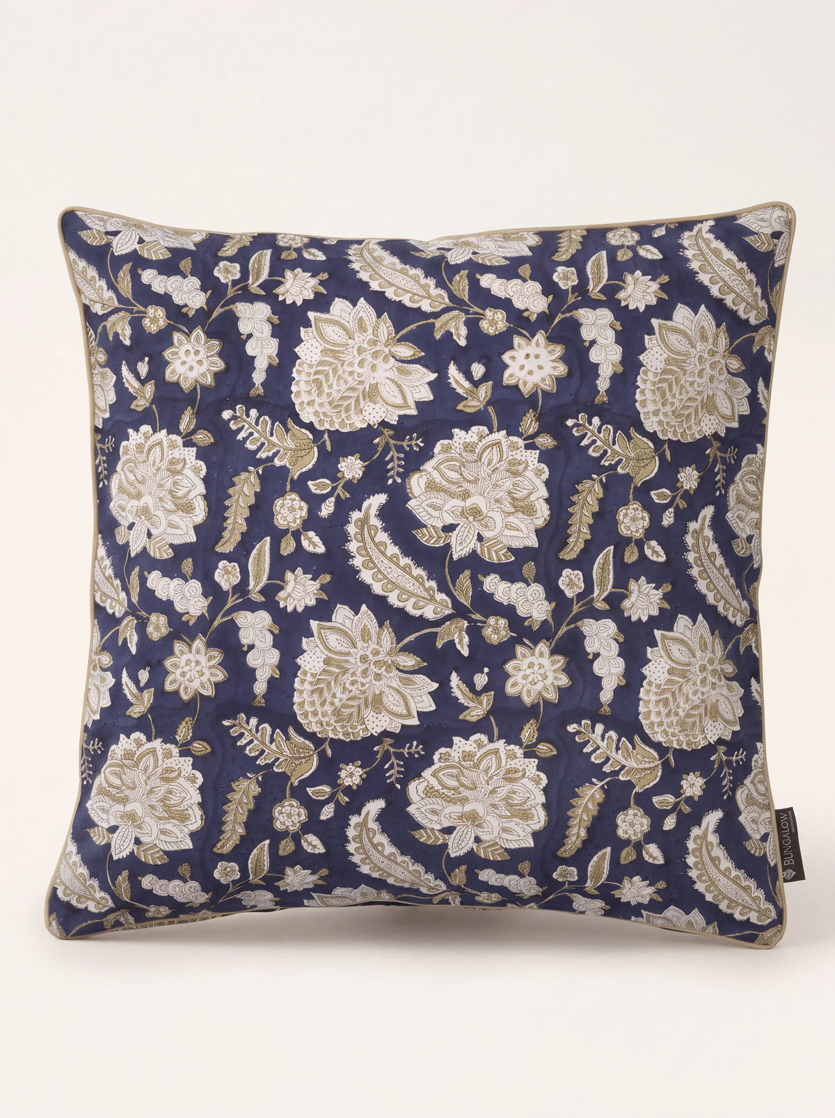 Square midnight blue cotton cushion with a floral block-print pattern and beige piped edges