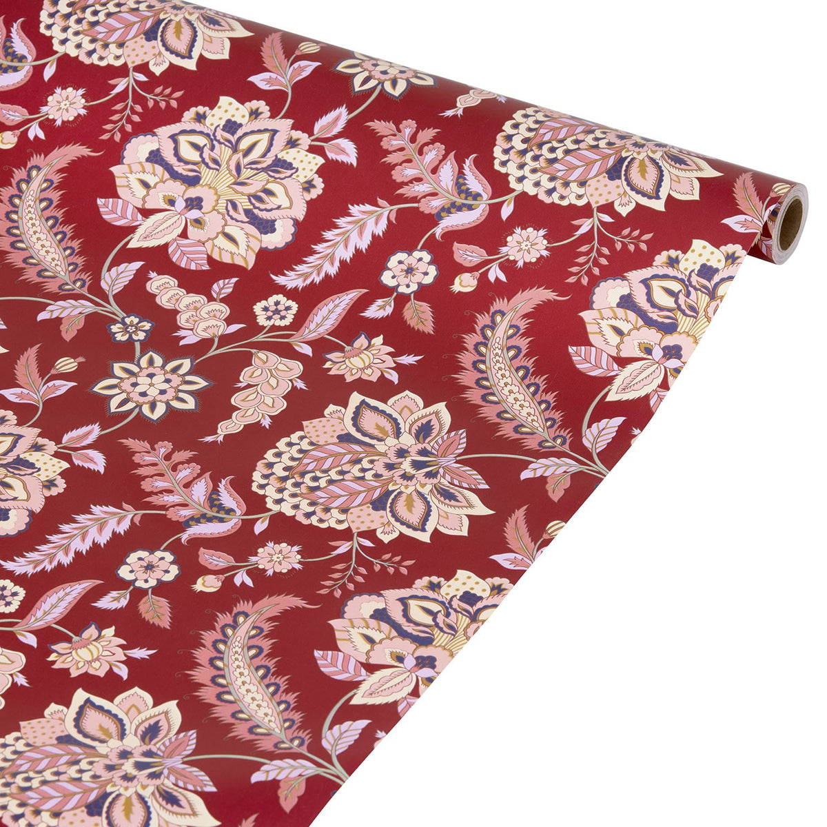 Roll of wine red wrapping paper with floral and paisley motifs in shades of pink, beige and purple
